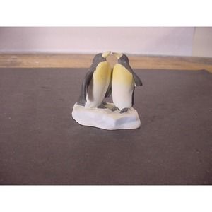 Pair of Penguins Figurine on an Iceberg
